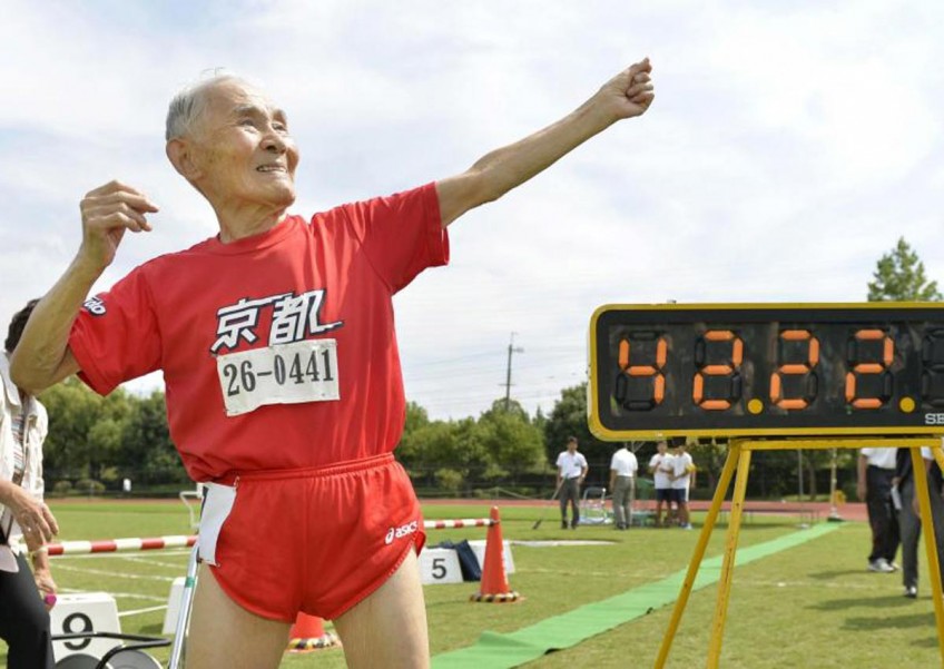 Japan's 105-year-old 'Golden Bolt' sets sprint record, misses personal best