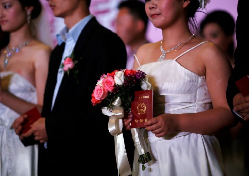 China's demure 'good for marriage' trend sparks feminist furore