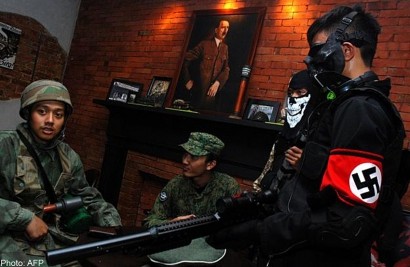 Controversial Nazi-themed cafe in Indonesia reopens, with swastikas intact